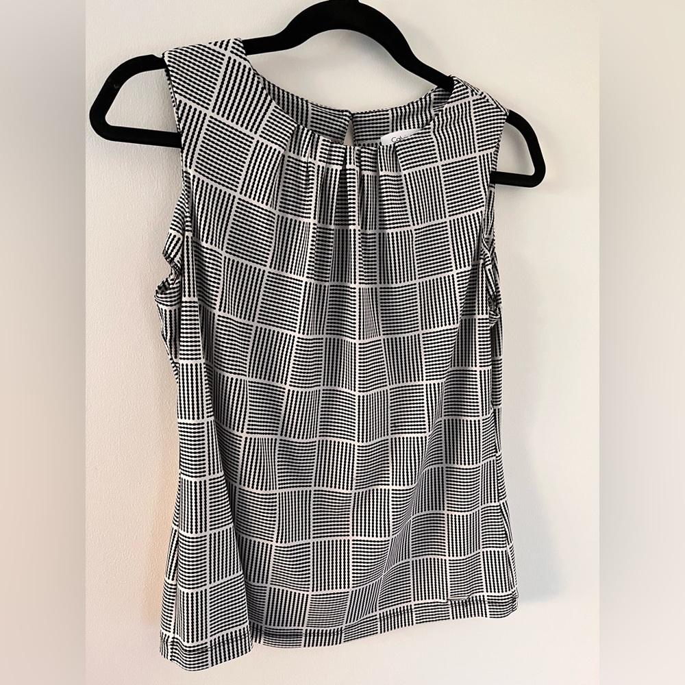 Calvin Klein sleeveless blouse. Medium